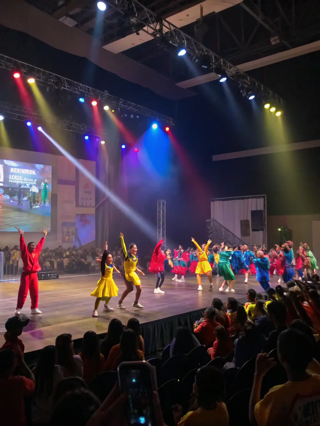 A photograph capturing the excitement and energy of a sportive dance competition, showcasing the club's participation in local and regional events.