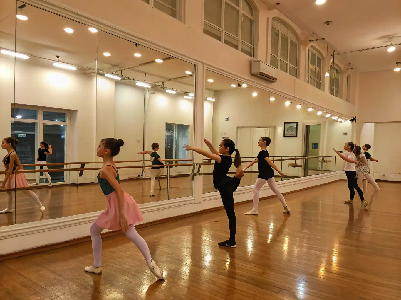 A group of dancers practicing ballroom dancing in a well-lit studio, showcasing elegance and coordination. The image should convey the joy and precision of ballroom dance.